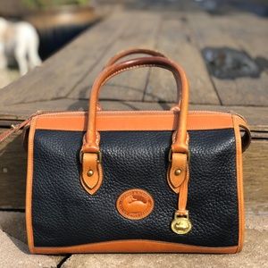 Dooney & Bourke dark blue and tan leather bag